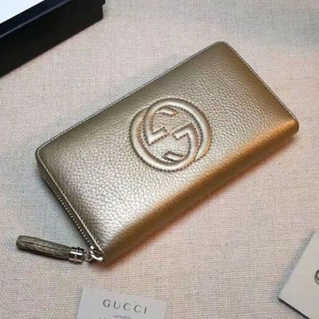 Gucci Leather zip around wallet 308004 gold